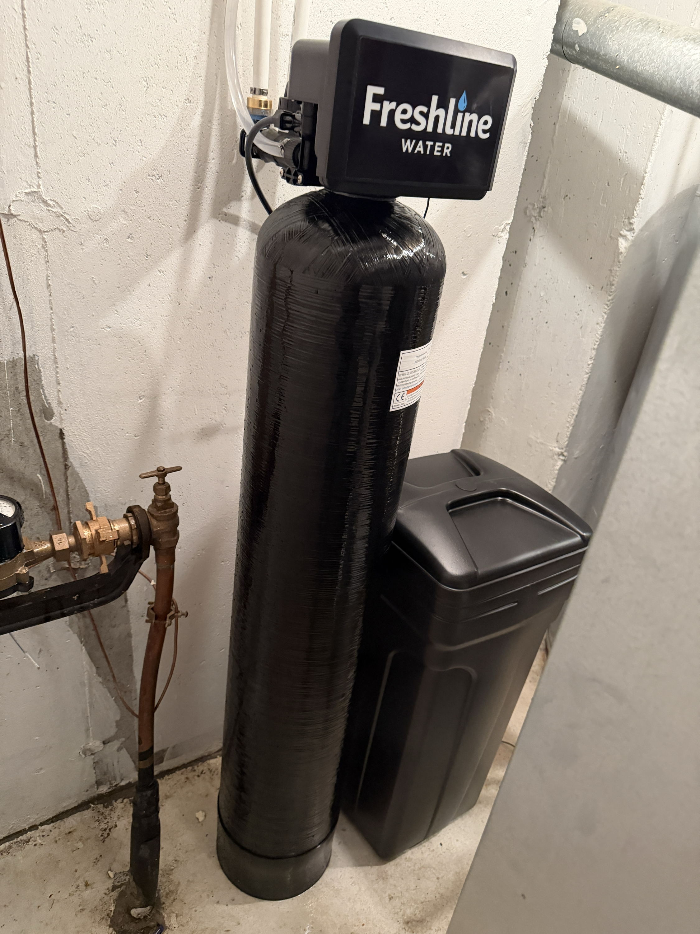 Freshline reverse osmosis system installed under a kitchen sink